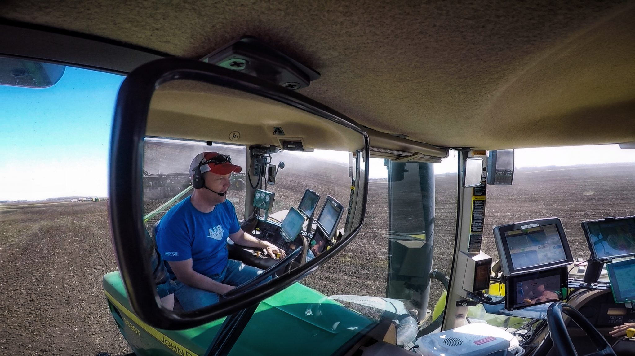Chris Nelson driving equipment during planting season